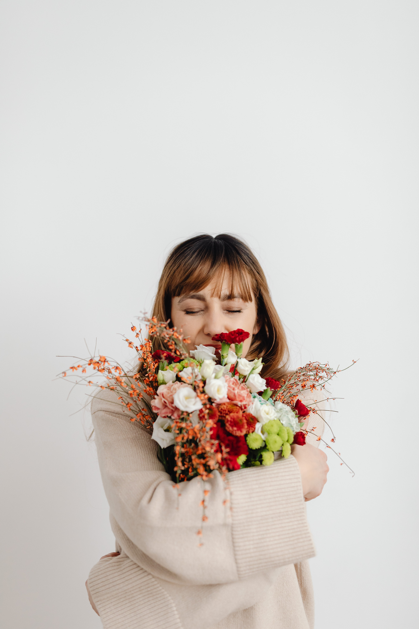 Woman Hugging Flowers